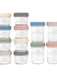 Set of 12 4oz and 8oz embossed glass jars with matte colored plastic lids and dry-erase marker on white background.