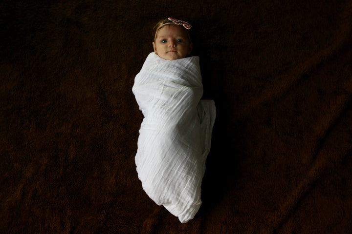 Baby swaddled in a blanket
