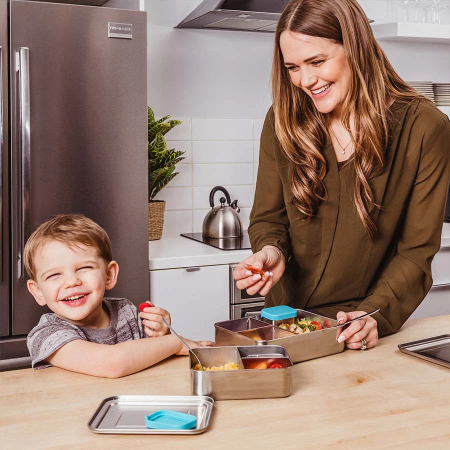 Mom and son pack their lunches in stainless steel bento boxes